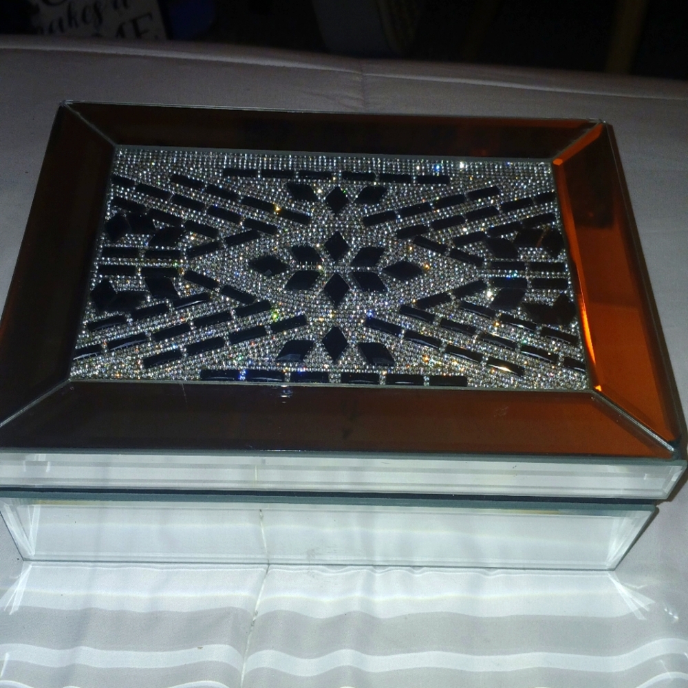 Very pretty jewelry box glass top. Black inside